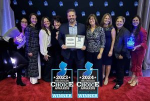 Atlantic Eye leadership team poses for photo holding trophy at The Monmouth County Community's Choice Awards